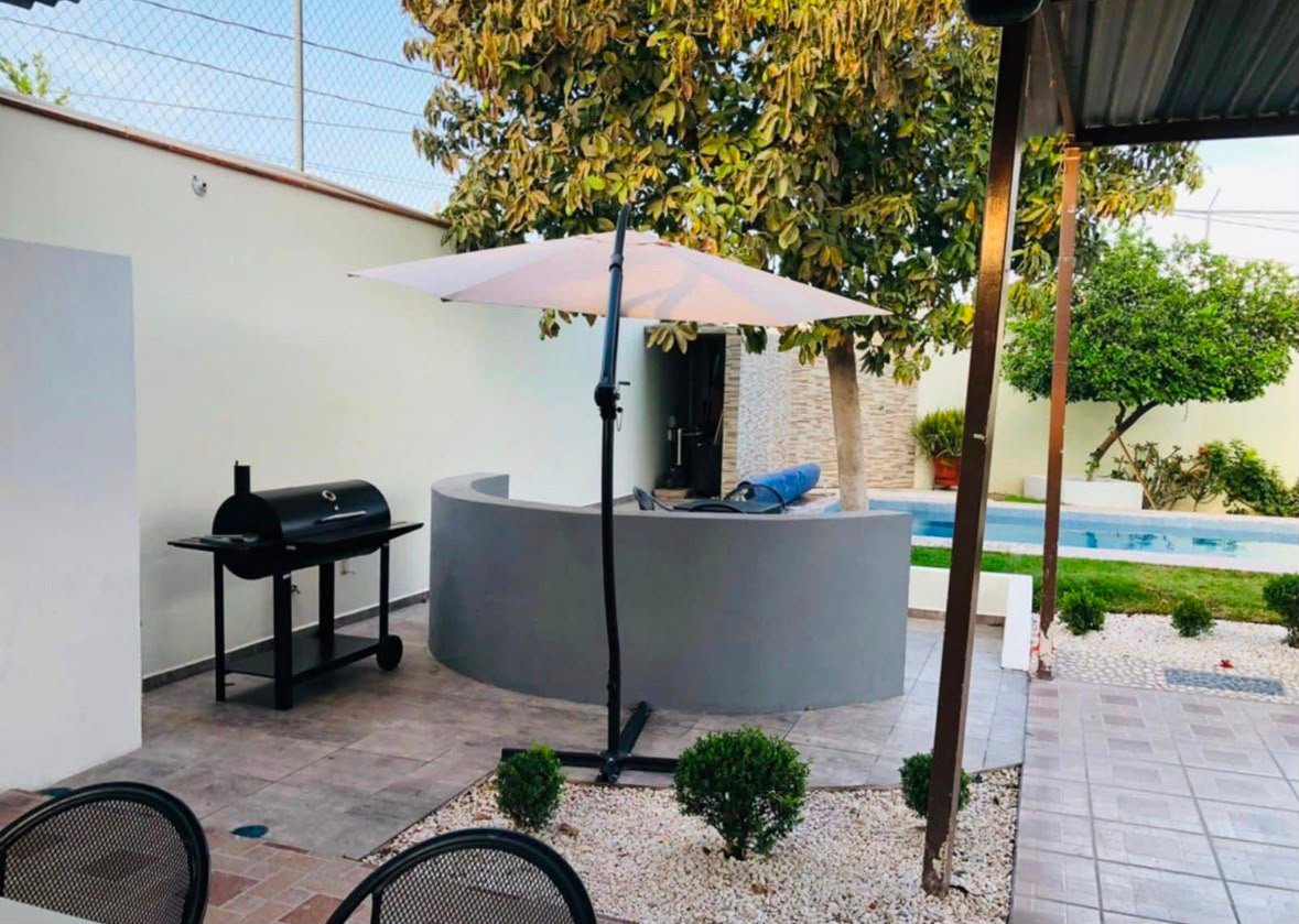 Área común y asador de la casa de fin de semana en Tequisquiapan